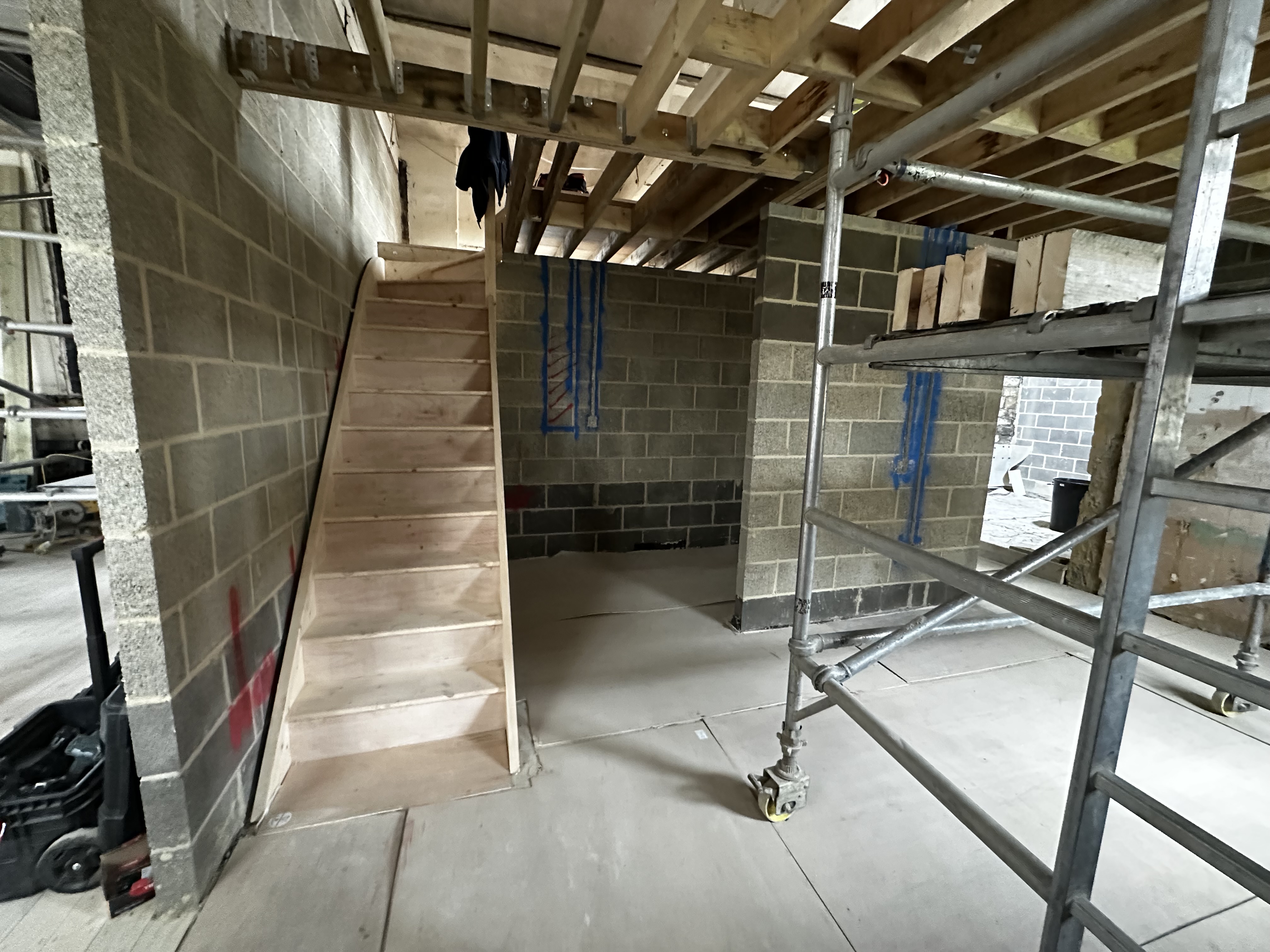 A view form the front door, showing entrance lobby and the steps up to the plant mezzanine. 